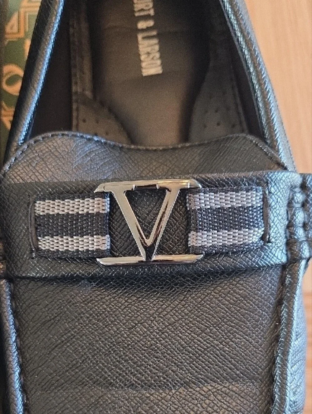 Black Men’s Slip-On Loafers with Silver Accent